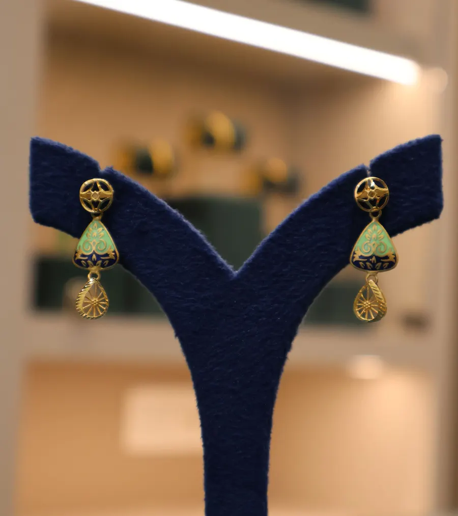 Gold drop earrings with mint enamel